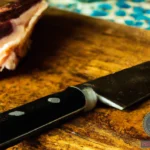 Cutting Raw Meat Dream Meaning: Understanding the Significance